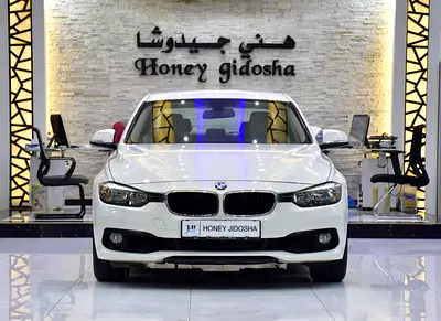 SERVICE HISTORY STICKER &amp; DATA AVAILABLE! BMW 318i ( 2016 Model ) in White Color GCC Specs