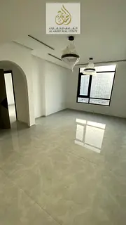 One bedroom and living room, first occupancy, 2 bathrooms, large area, on Ajman Corniche