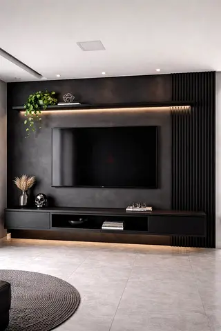 Modern wall-mounted black entertainment unit with LED lighting