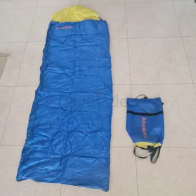 Lightweight single sleeping bag with carry pouch - good condition