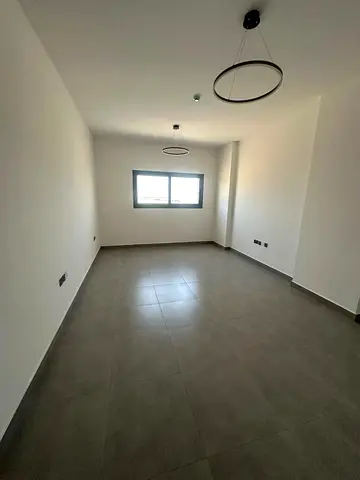 One bedroom and living room, first occupancy, for annual rent in Sharjah, Tilal City | New building, first occupancy | 2 bathrooms with balcony | Luxu