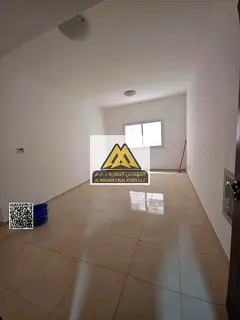 One-bedroom apartment with hall in Al Jurf 2, balcony, near Ajman University, lively and serviced lo