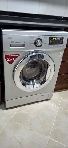 LG 2-in-1 Front Load washer dryer 8/4 (Silver) - Good Condition, free delivery installation