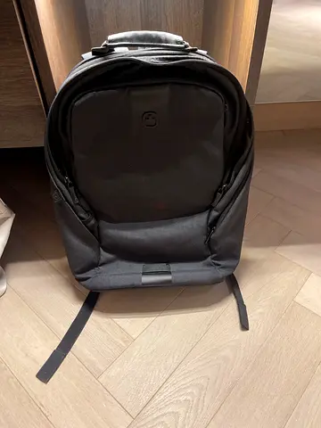 Used black laptop backpack with padded compartment — good condition