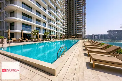 Elegant 2BR Beachfront Pool&Gym Access