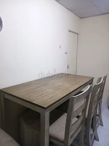 Wooden dining table with 4 matching chairs - light oak finish