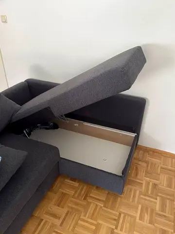 Grey L-shaped Sofa with Storage - Good Condition