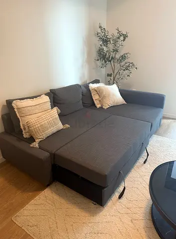 Grey L-shaped Sofa Bed with Storage - Good Condition