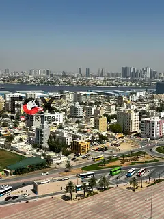 Two bedrooms and a living room for annual rent in Al Bustan area, close to Ajman Corniche, balcony,