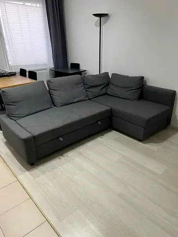 Grey L-shaped Sofa Bed with Storage — Good Condition
