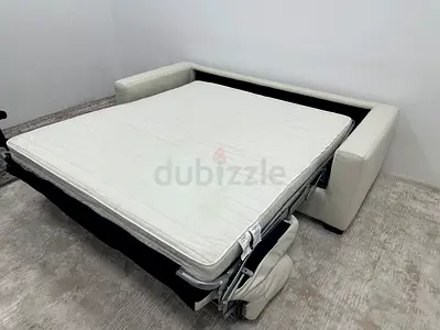 Selling pure leather Natuzzi sofa bed