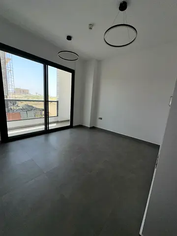 Luxurious and elegant two-bedroom apartment, brand new, in Tilal City | Balcony | High-end finishes
