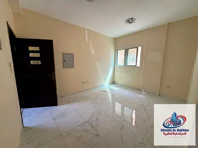 One-bedroom apartment in Al Qulaya area, Sharjah, available for annual rent. Suitable for families and boasts a stunning sea view.