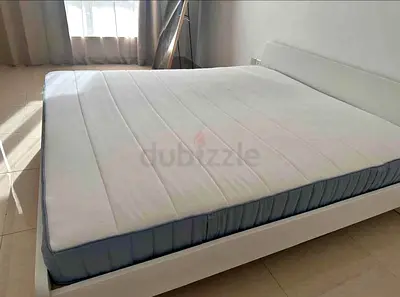 Ikea king size askovol bed frame and Ikea mattress is available