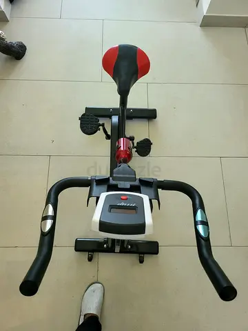 Compact Exercise Bike with Adjustable Seat and Digital Monitor