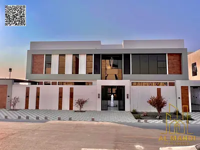 فيلا راقية للبيع في منطقة الزاهية بتصميم عصري فاخر يجمع بين الفخامة والمساحة الواسعة، تقع على أرض كبيرة بمساحة 6500 قدم مربع، مما يمنحك خصوصية تامة وم