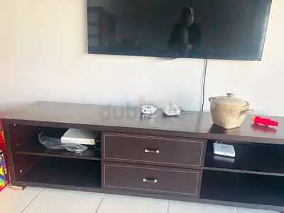 Dark Wood TV Unit with Two Drawers - Good Condition TV table 250 and also TV is 250 condition is goo