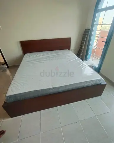 IKEA malam king size bed with IKEA mattress 180×200cm and 2 storage drawers underneath im