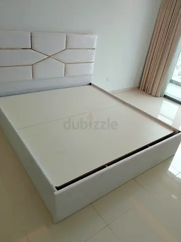 Queen storage bed with upholstered headboard - like new