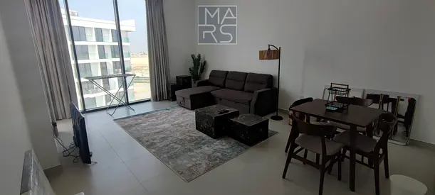 Modern 1-bedroom apartment with a living room available for rent in "Ajmal Makan" compound, a premium and peaceful residential community.