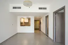 Elegant 1BHK | Pool View Balcony | Designer Living | Walk to Mall