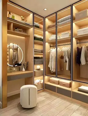 Modern L-shaped Walk-in Wardrobe with Glass Doors and LED Lighting
