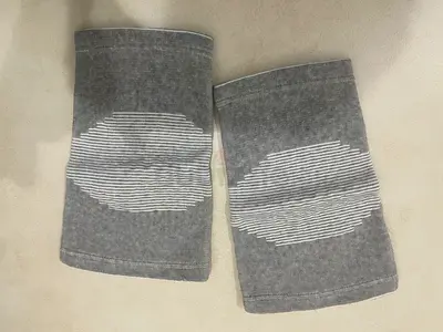 Pair of grey elastic knee/elbow support sleeves – never used