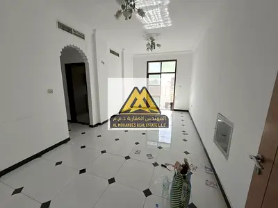 One Bedroom Apartment for Annual Rent in Al Rawda 3 Ajman Second Tenant Balcony Spacious Layout Central AC Sheikh Khartoum Street