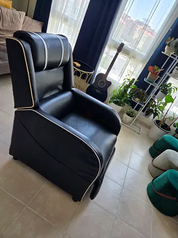 Black Leather Recliner with White Piping — Very Good Condition