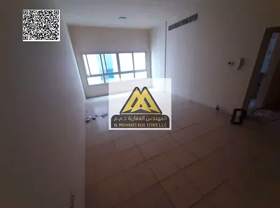 A fantastic opportunity for annual rent in Liwara 1, Ajman. This spacious studio apartment features a practical design, a separate kitchen, and a balc