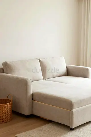 Light Beige Two-Seater Sofabed with Chaise - Good Condition