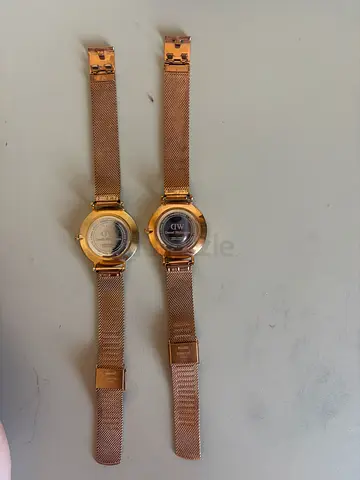 Pair of rose gold womens wrist watches - matching mesh bands