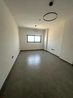 Luxury one-bedroom apartment for rent in Sharjah, near Victoria School, directly on the Dubai exit.