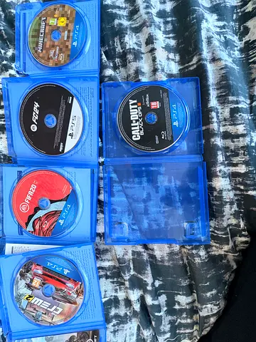 Collection of PS4  PS5 Game Discs — FIFA, Call of Duty, Minecraft, The Crew, FC24