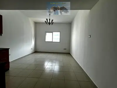 Studio apartment for rent in Al Mamzar, Sharjah, with parking, gym, and swimming pool.