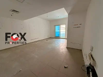Two bedrooms and a living room for annual rent in Ajman, Al Rashidiya 3 area. Free air conditioning and free parking. Price: 48,000