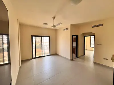 Two bedrooms and a living room - lowest prices - prime location - Al Jurf 3 - with a balcony - family accommodation - spacious