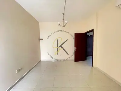 🌟 Cozy Unfurnished 1BHK | Balcony | 870 Sqft | Prime Living in Muwailah Commercial – Sharjah 🏡🌅✨