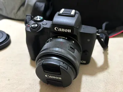 Canon m50 with 15-45mm kit lens + other accessories for sell