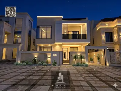 Luxury villa for sale in Al Zahiyah area, Ajman, next to Al Qabail Mall and near the mosque, price includes registration and ownership fees.