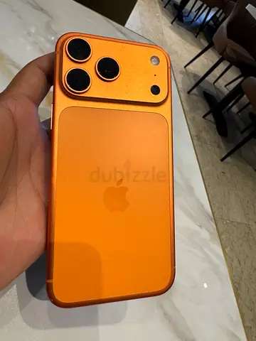 iPhone 17 pro max with protective orange case — good condition