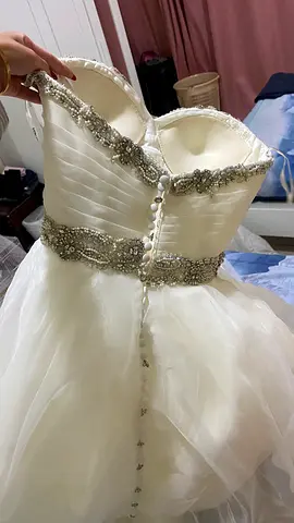 White strapless wedding dress with beaded belt and corset back