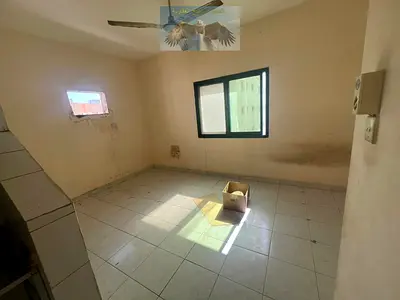 Large studio with separate kitchen for annual rent in Sharjah, Al Naba’a, excellent finishing, payment facilities available.