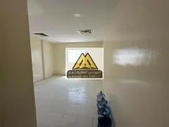 Studio for Annual Rent in Al Rashidiya 2 Ajman Spacious Layout Semi-Separate Kitchen Central AC Prim
