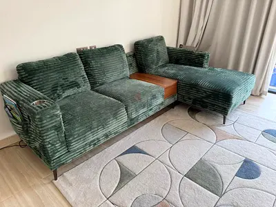 Green Corduroy L-Shaped Sofa with Built-in Side Table and Cup Holders