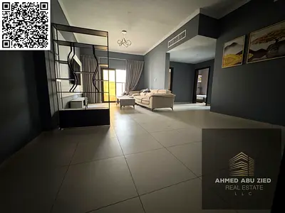Luxury new 2BHK apartment with 2 baths, balcony, central AC, full maintenance, prime location near Dubai & Sharjah exits and all services