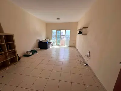 Two-bedroom apartment with a living room for annual rent in Al Nuaimiya 1, Ajman, on Sheikh Khalifa Street, in a vibrant location close to all service