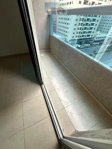 Luxury one-bedroom apartment with a living room in Al Mamzar / free parking / free gym and swimming pool / balcony with an open view