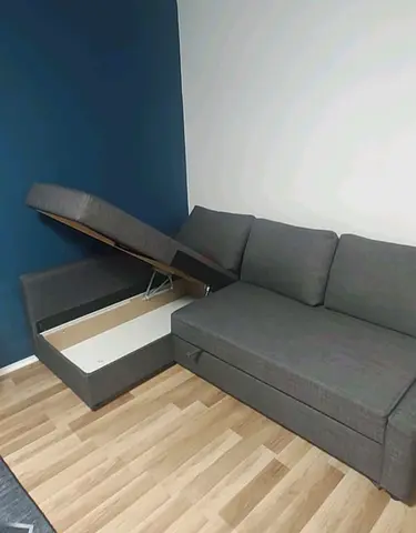 Grey L-shaped Storage Sofa Bed — Good Condition