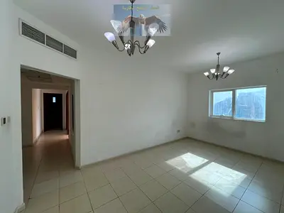 Two bedrooms and a living room in Al Taawun, with free parking, gym, swimming pool and balcony